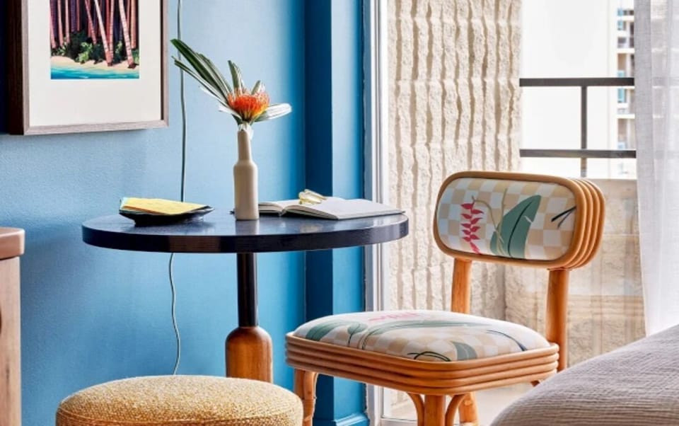Work or journal by the window with calming natural light.
