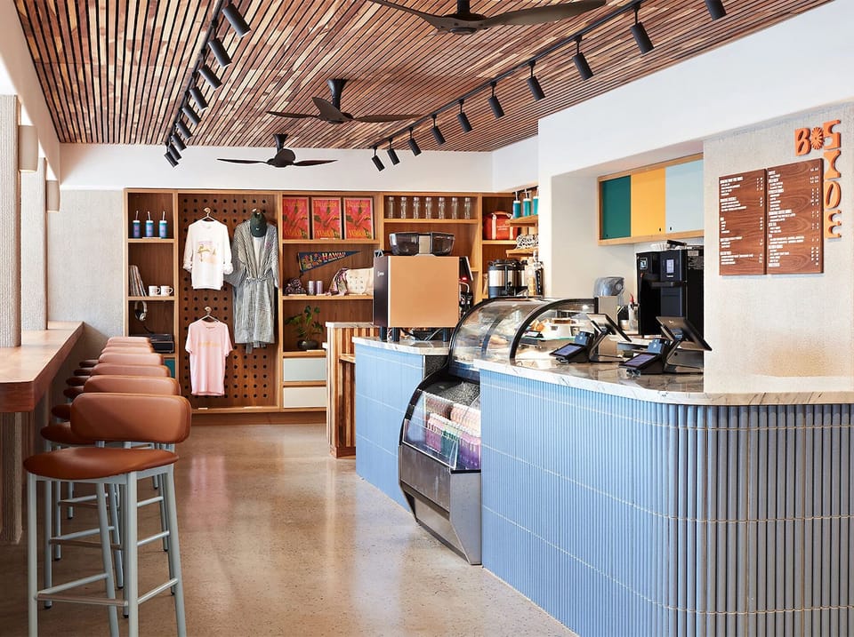 Sip fresh coffee at a bright bar with modern seating