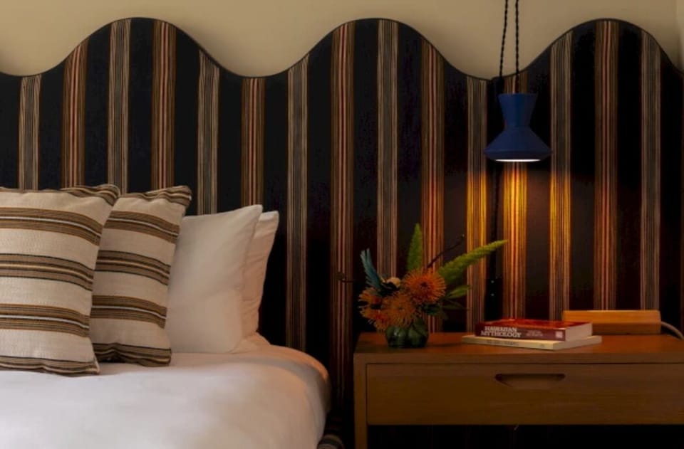 Settle into a cozy corner with soft glow and textures.