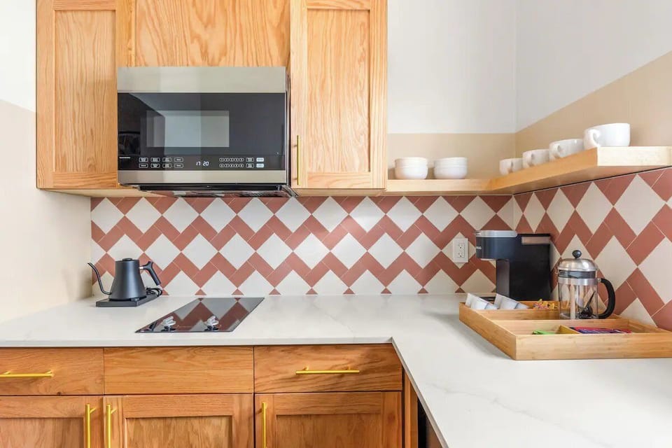 Start mornings right with a sleek kitchenette for quick meals.