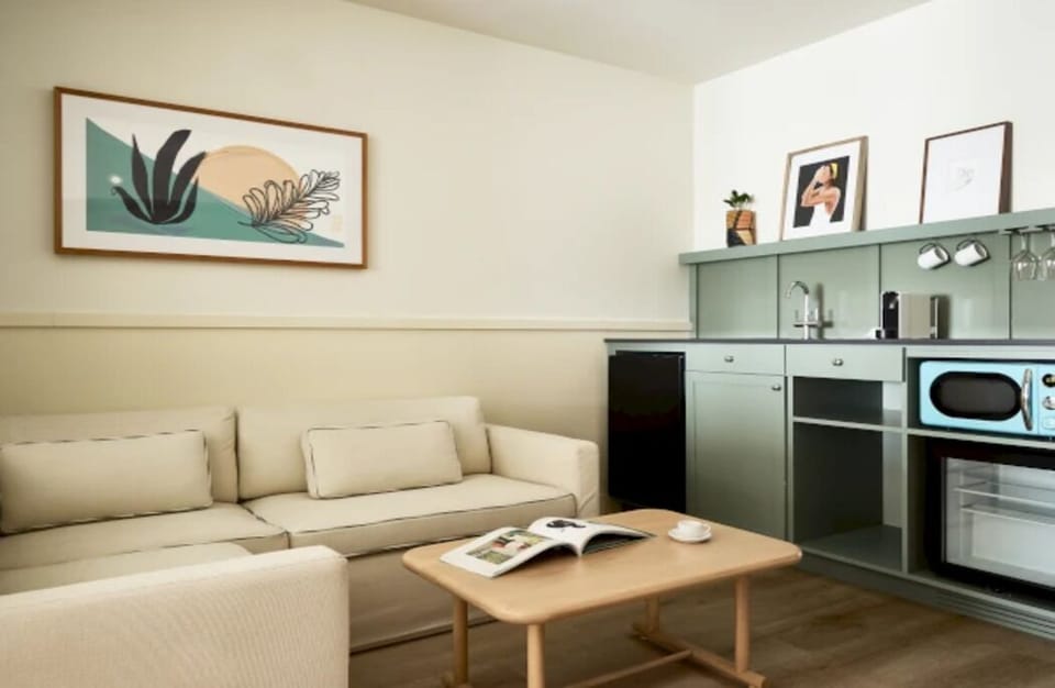 Brew coffee and prep easy bites in the sleek kitchenette.