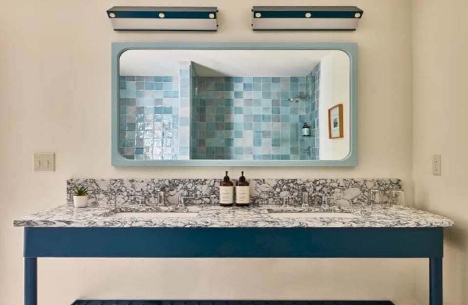 Start your day at the marble vanity with spa-like ease.