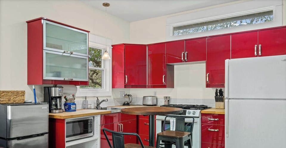Fully equipped kitchen with gas range, dishwasher, coffee maker, and toaster. Everything you need for meals in or snacks on the go.