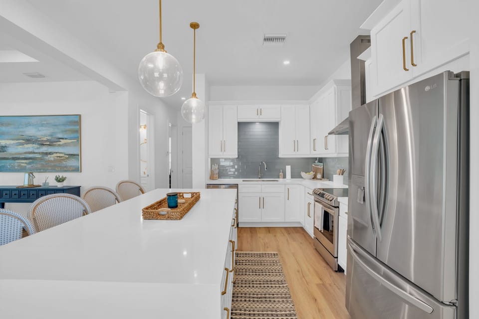 Fully equipped kitchen w/modern appliances & everything you need to cook at home