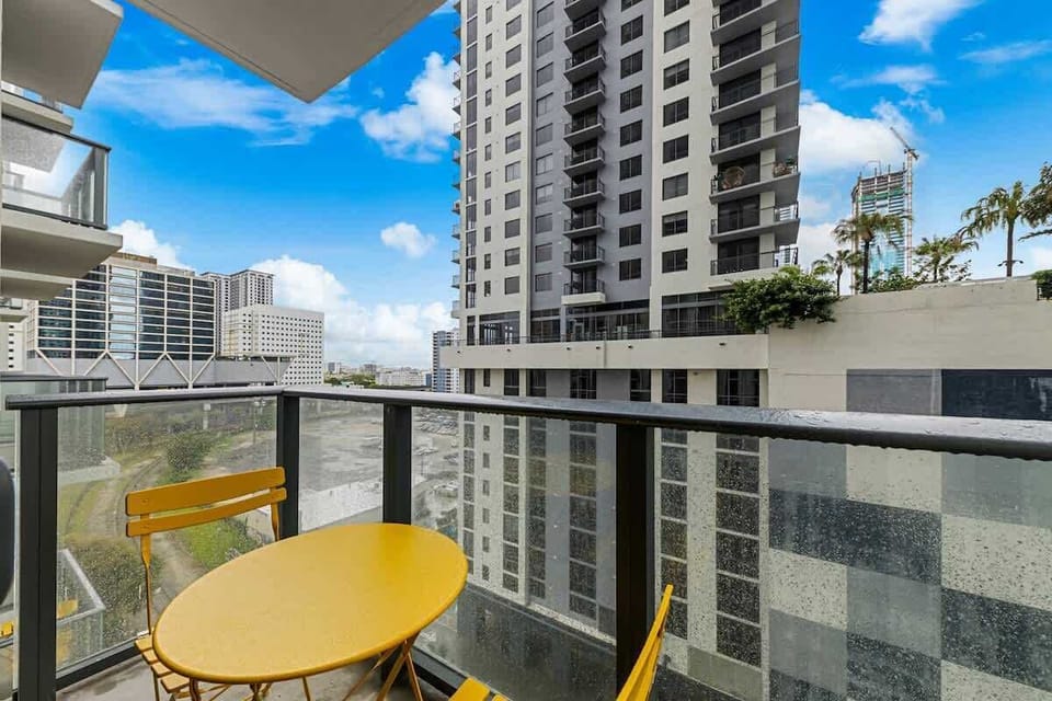 Private balcony with seating and small table