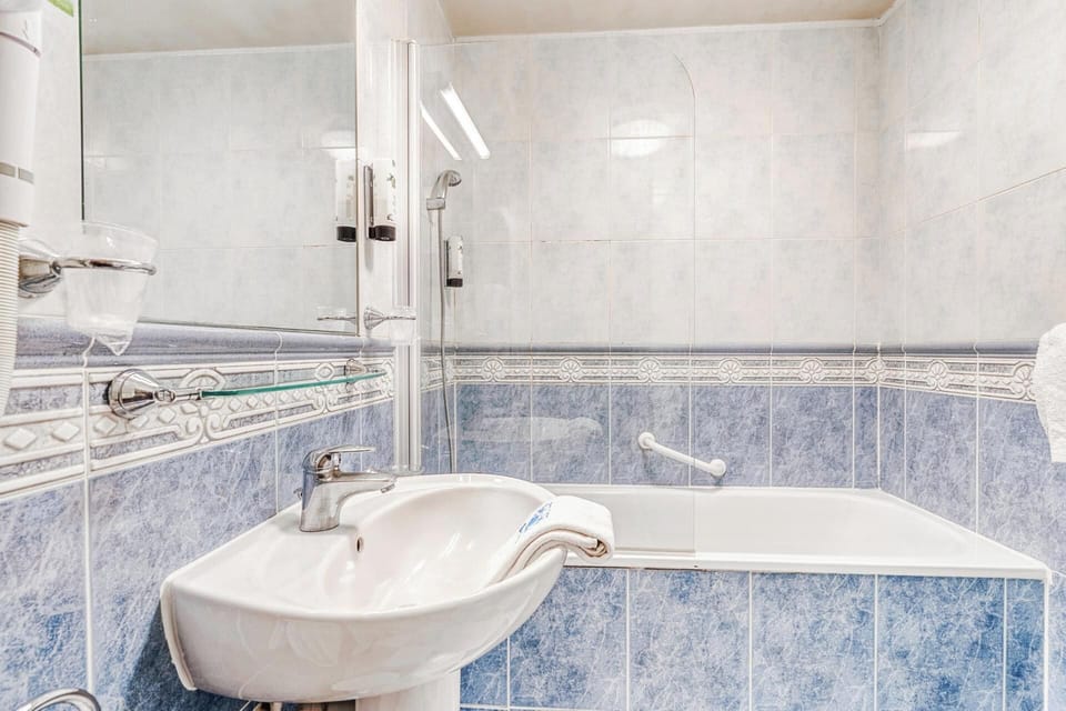 Hair dryer, towels, soap, shampoo