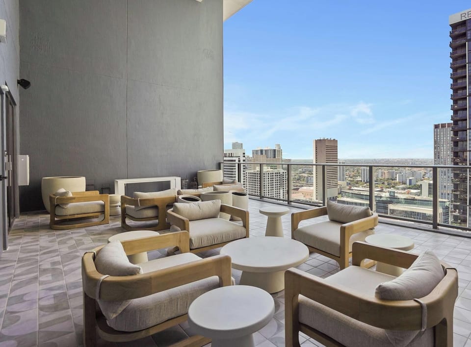 Shared seating area with panoramic skyline views