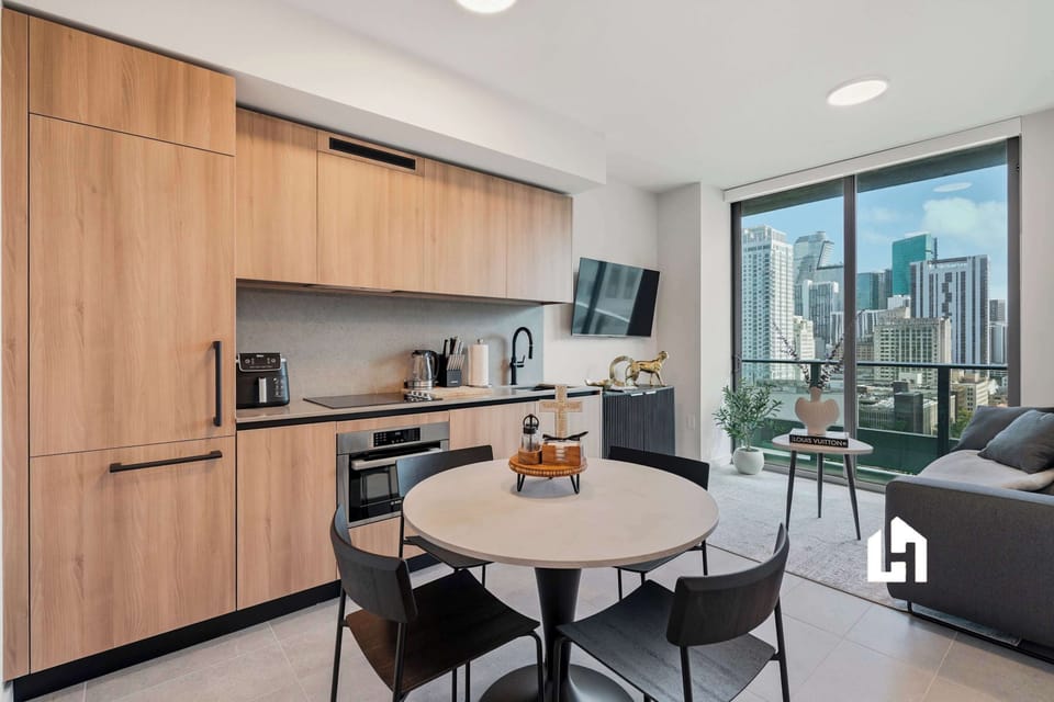 Sleek kitchen with modern appliances and plenty of space to prepare meals.