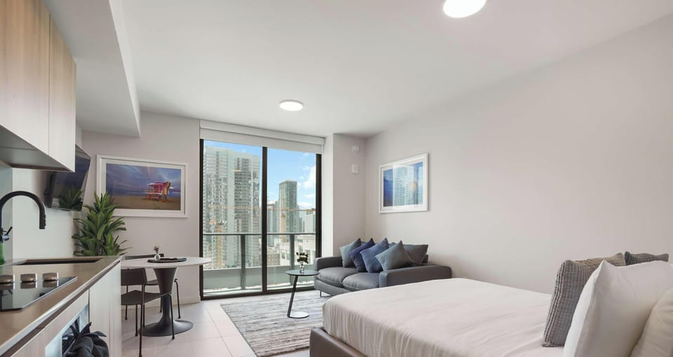 Wake up to stunning city views from this bright and airy studio.