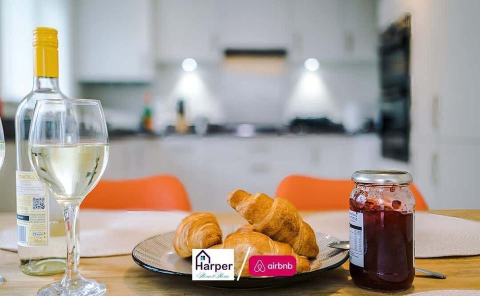Enjoy family meals or relaxed evenings in this modern dining area with natural light and seating for six. Perfect for gatherings, work breaks, or sharing a bottle of wine after a long day.