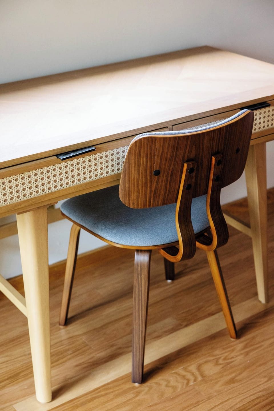 Office desk and chair for meetings, work, or drawing.