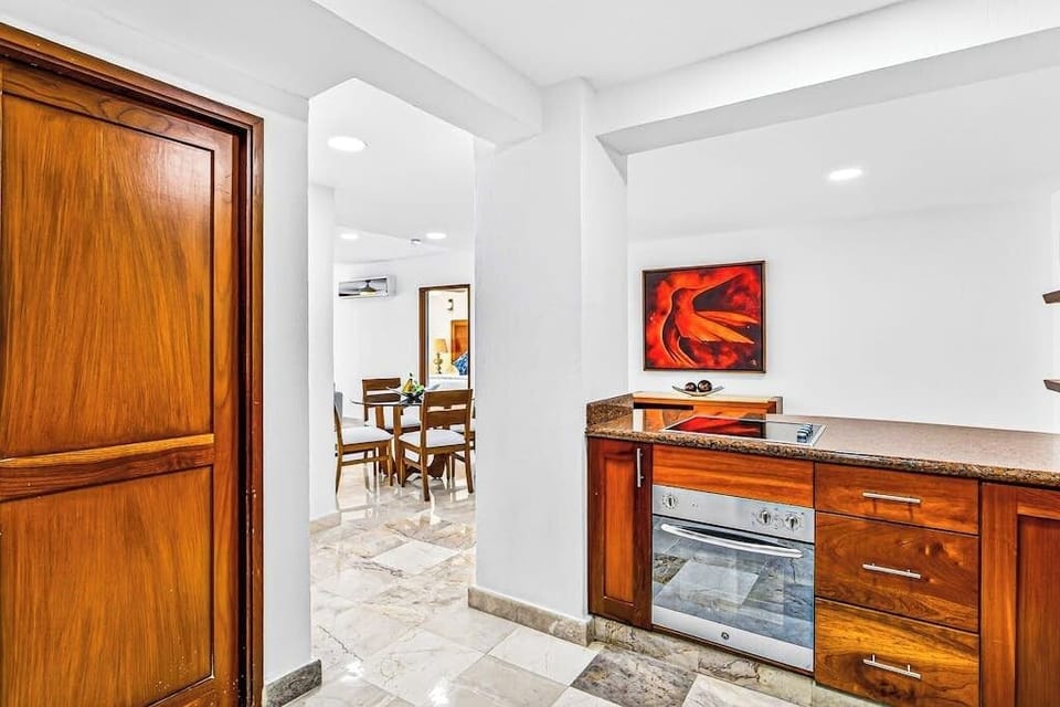Apartment, Multiple Beds, Pool Access, Partial Ocean View (Grand Miramar B104) | Private kitchen