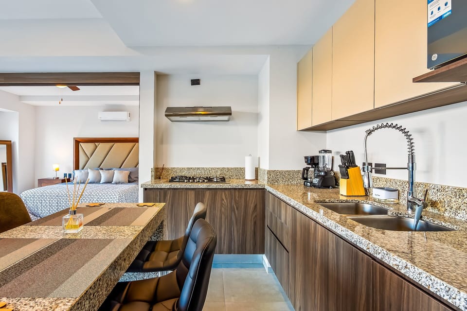 Condo, 1 King Bed with Sofa bed, Balcony, Pool View (DUVA, Unit 105) | Private kitchen