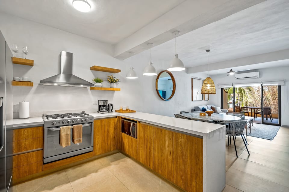Apartment, Multiple Beds, Balcony, Garden View (Condominio en la Marina) | Private kitchen