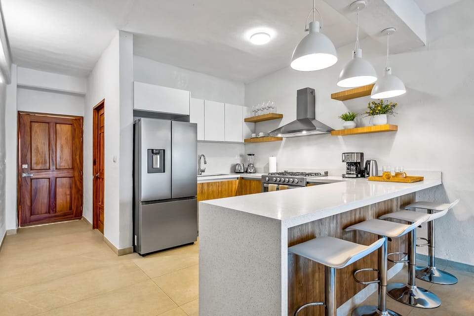 Apartment, Multiple Beds, Balcony, Garden View (Condominio en la Marina) | Private kitchen