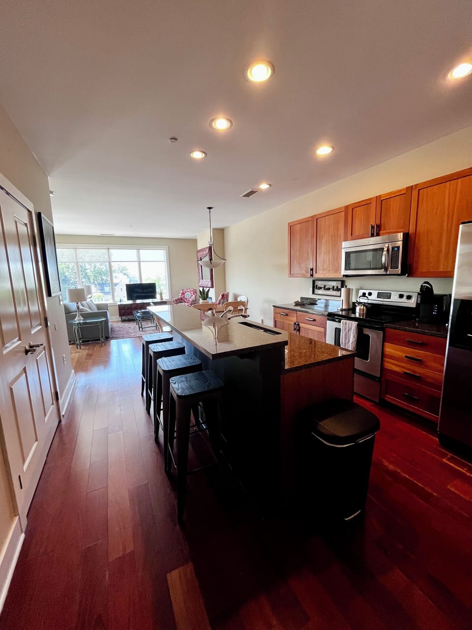 Open and airy kitchen is stocked with all the things you need to feel at home.