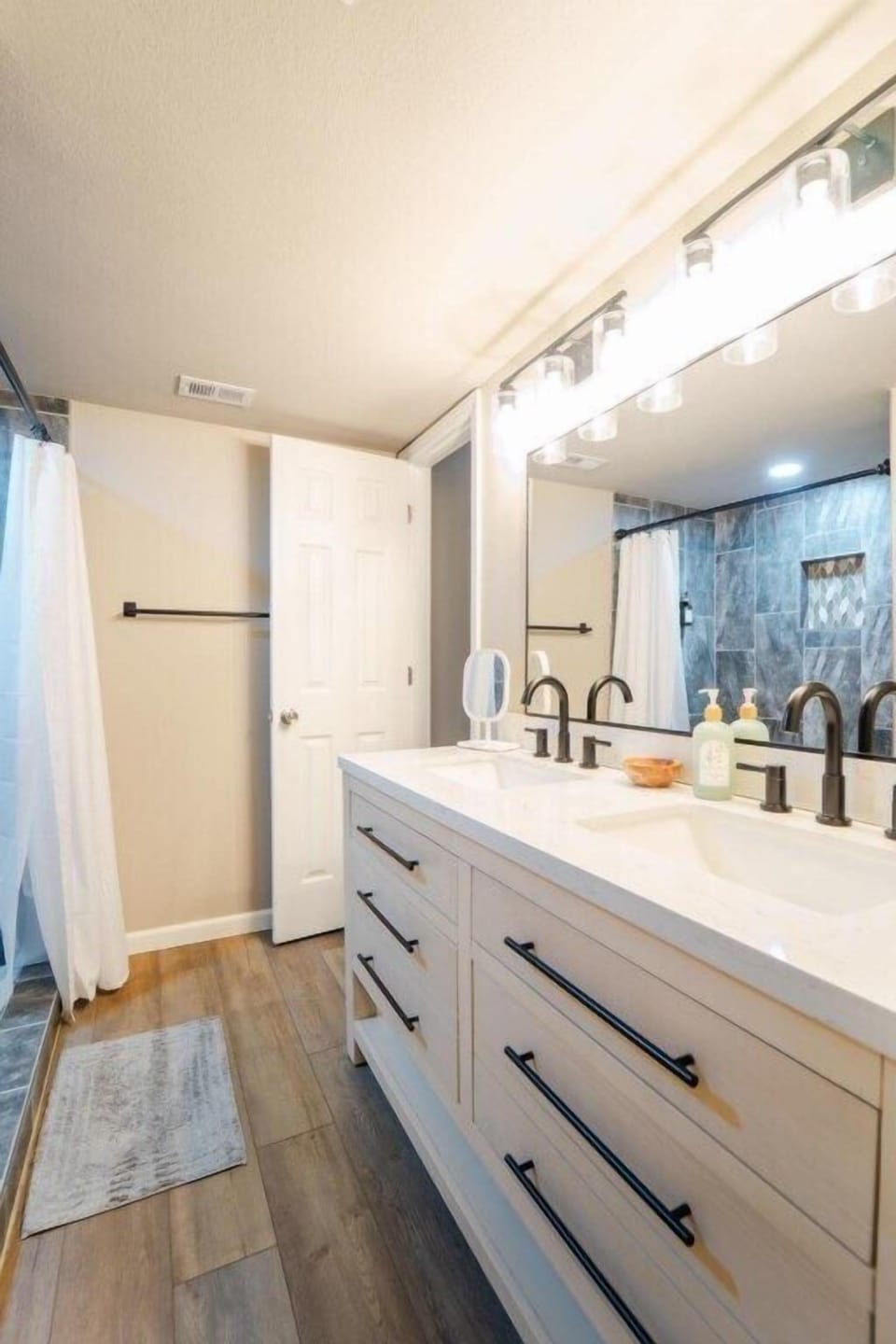 Full bathroom with walk in shower on main/ lower level 