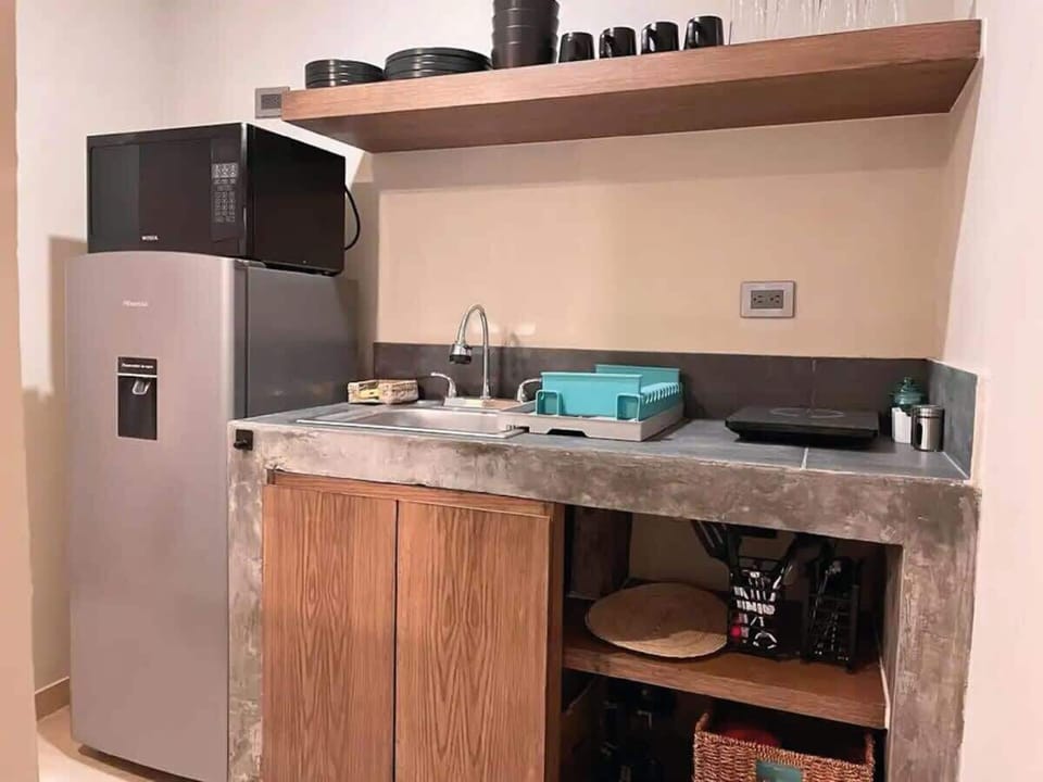 Cocina con las amenidades necesarias para tu estancia.