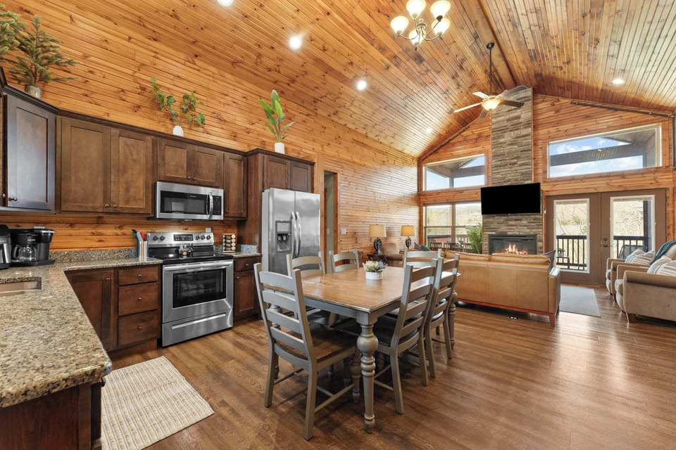 The open concept keeps the family together, whether cooking in the kitchen or watching a movie on the couches.