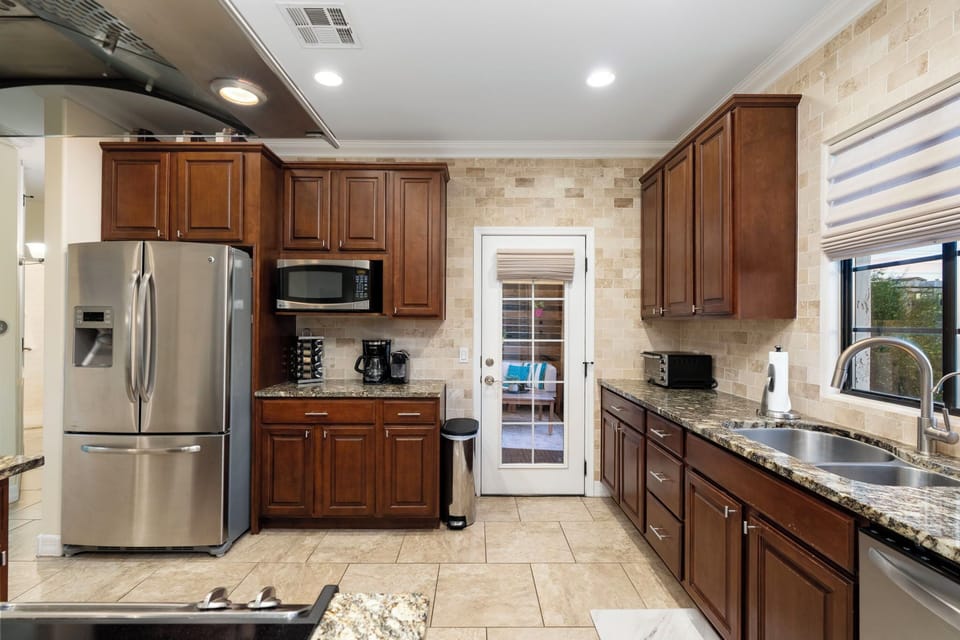 Direct access to the private patio allows for easy al fresco dining anytime!