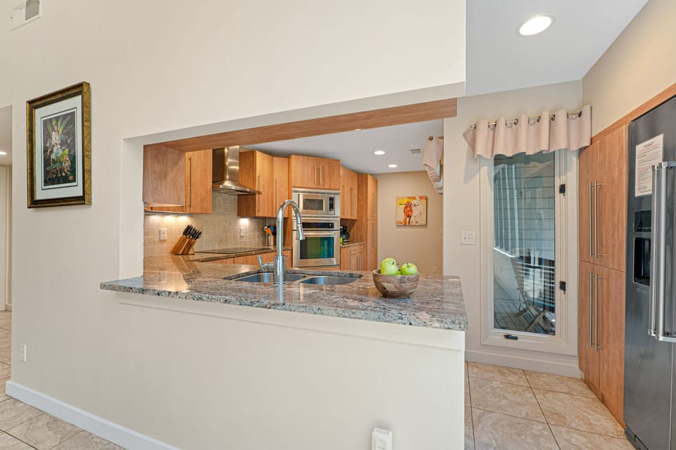 This kitchen opens directly into the main living space, keeping everyone connected throughout the stay.