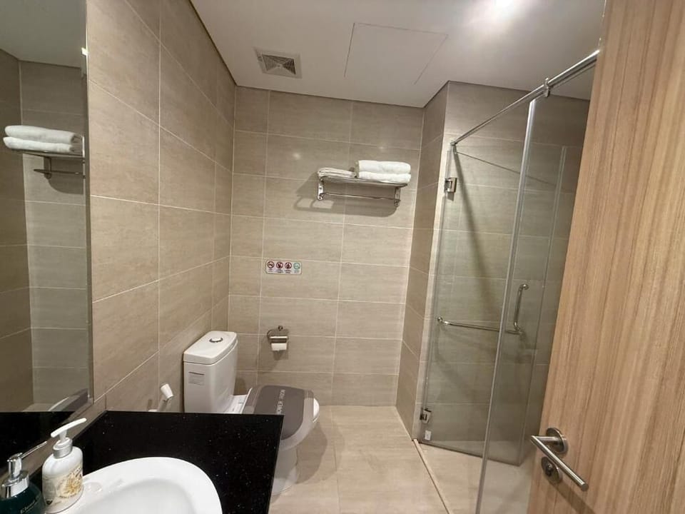 Family Room, City View | Bathroom | Free toiletries, slippers, soap, shampoo