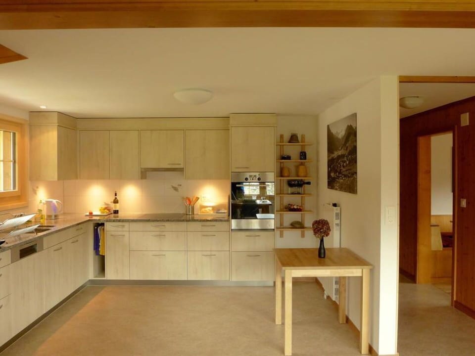 Property, Furniture, Table, Cabinetry, Wood, Countertop, Interior Design, Living Room, Flooring, Kitchen