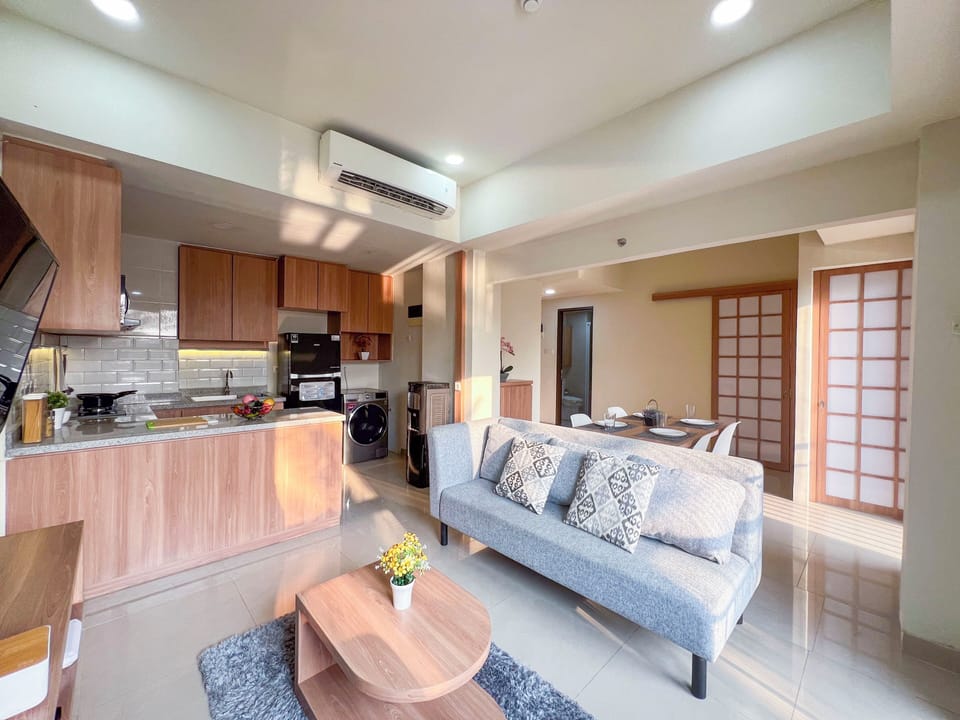 Deluxe Apartment, 2 Bedrooms, Balcony, City View | Living area | 32-inch LED TV with cable channels