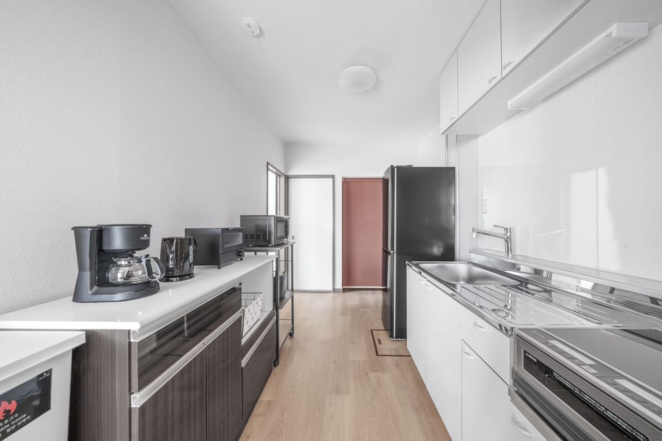 Apartment | Private kitchen | Fridge, microwave, stovetop, rice cooker