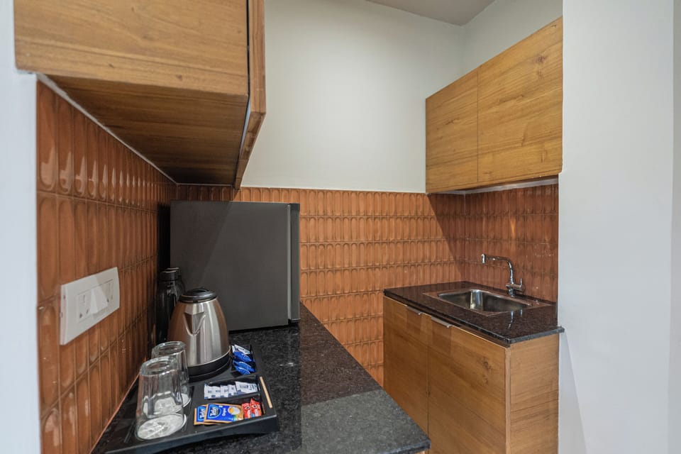 Mini-fridge, cookware/dishes/utensils