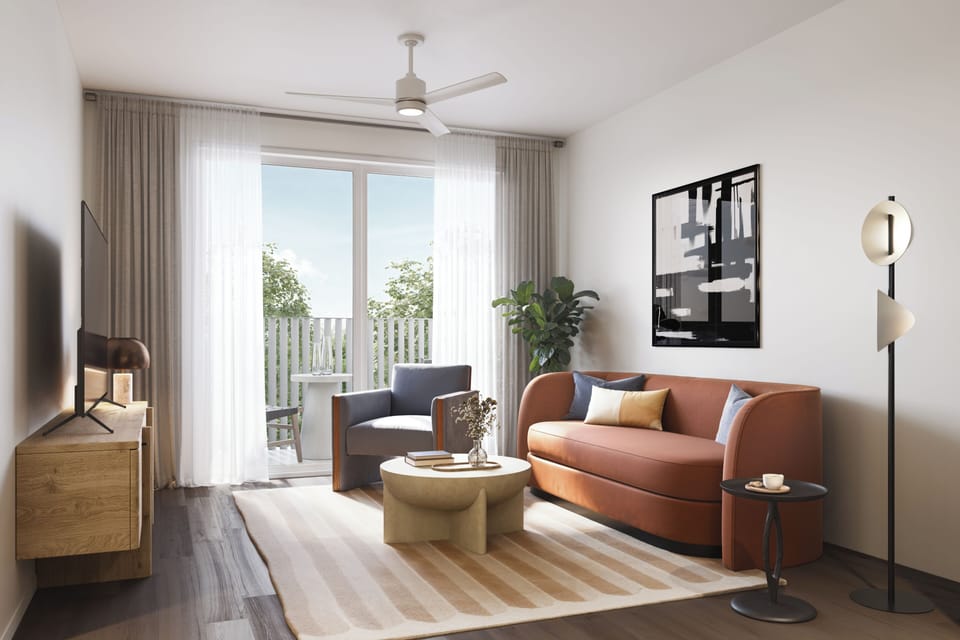 Modern living room with a large balcony and pool view.