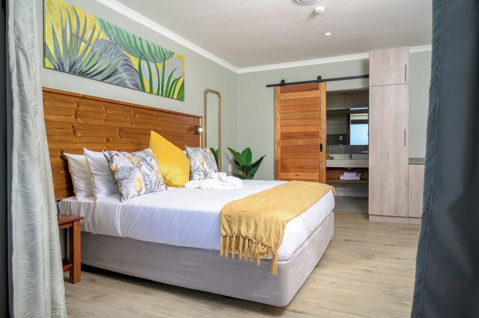 Honeymoon Suite | Premium bedding, down comforters, in-room safe, blackout drapes