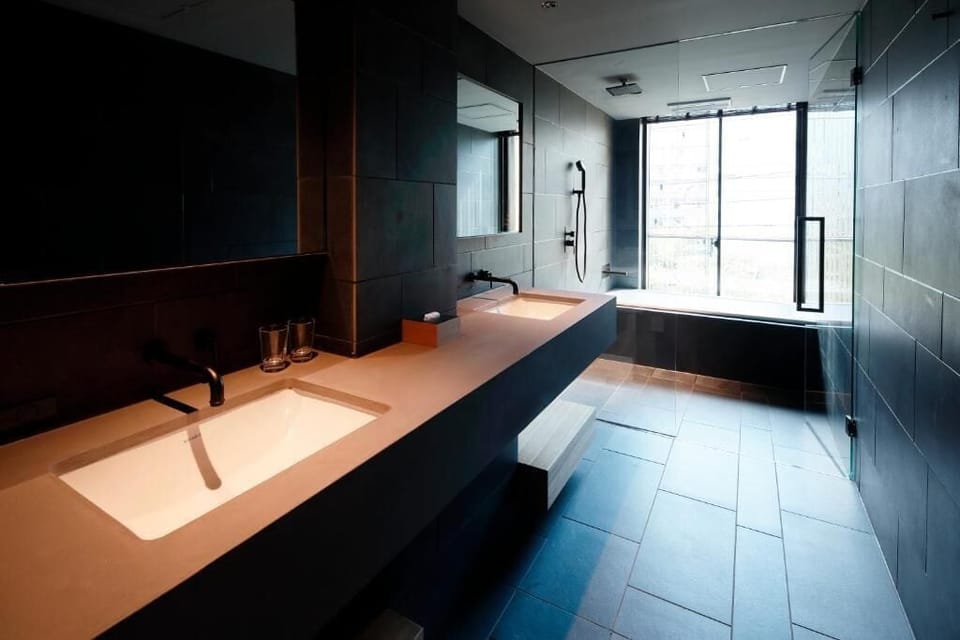 King Room with City View-4th Floor | Bathroom | Combined shower/tub, free toiletries, hair dryer, bathrobes