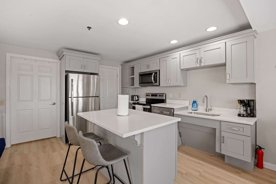 This unit comes ready to cook with all standard appliances and a large island.