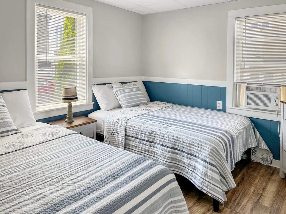 Bedroom has two full  beds and can sleep 4 guests. Picture is likeness only.