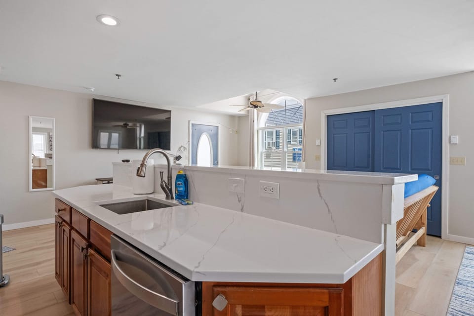 Dishes are a breeze with a deep sink and dishwasher.