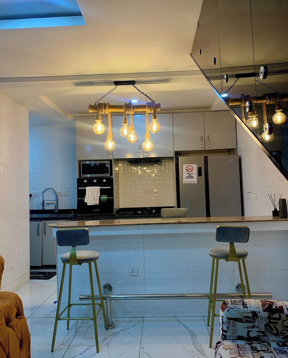 Family Room, Balcony, City View | Private kitchen