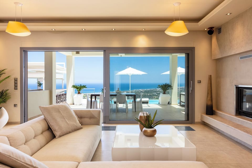 Villa, Sea View | Living room | 50-inch Smart TV with cable channels, fireplace, video-game console