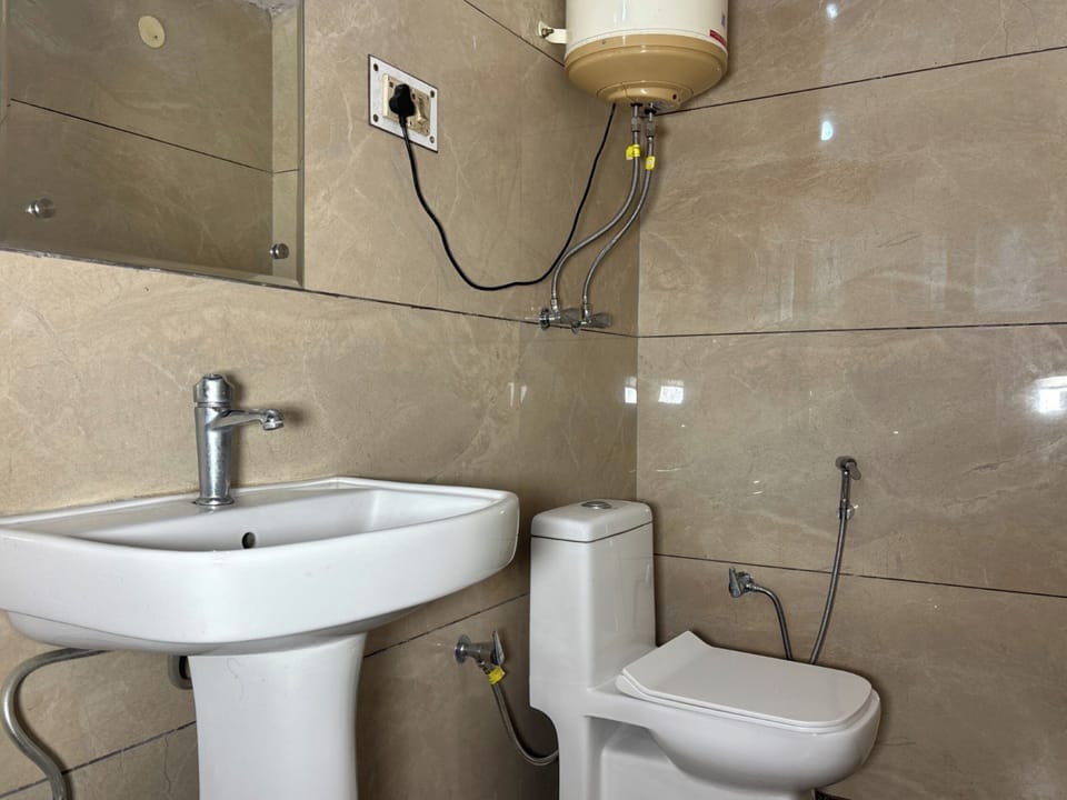 Premium Double Room, Mountain View | Bathroom | Shower, rainfall showerhead, towels, soap