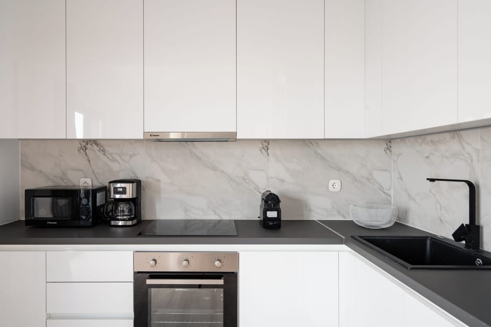 Luxury Apartment | Private kitchen | Full-size fridge, microwave, oven, stovetop