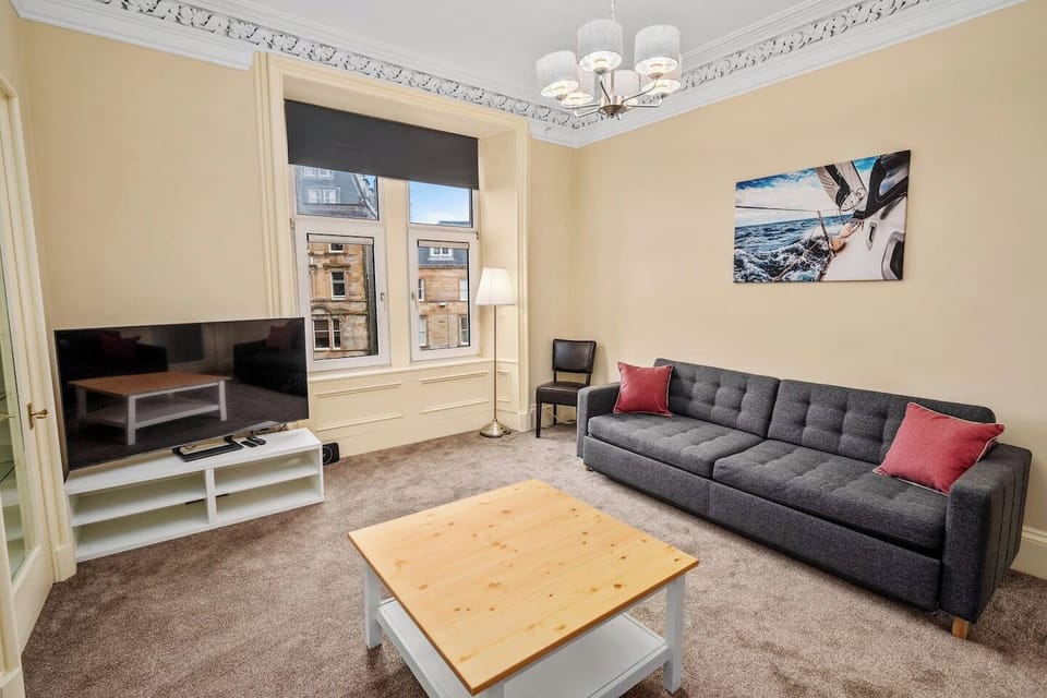 Large comfortable living room with sofa bed.