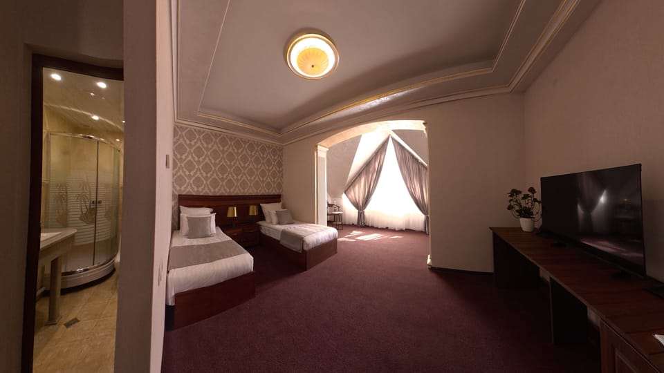 Deluxe Twin Room, City View | In-room safe, desk, soundproofing, iron/ironing board