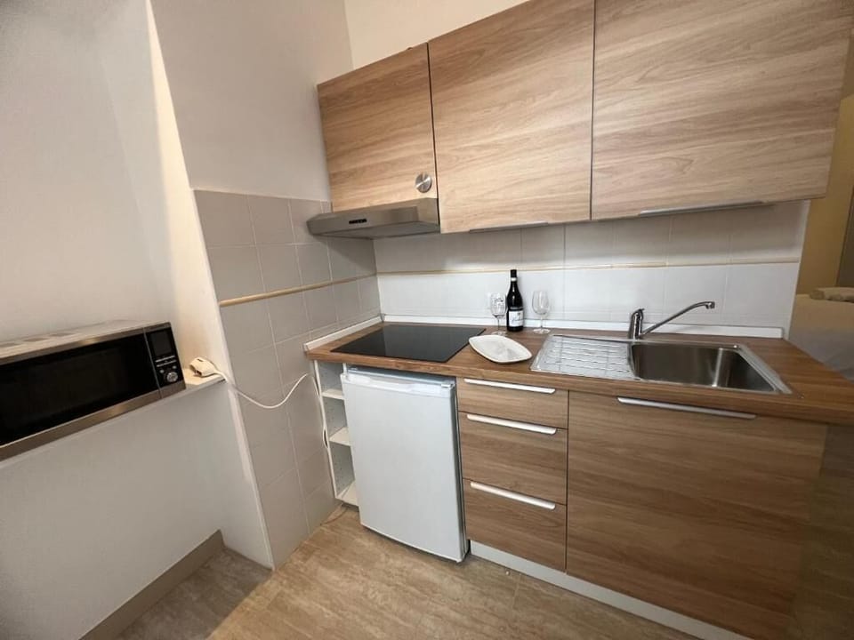 Mini-fridge, microwave, stovetop, espresso maker