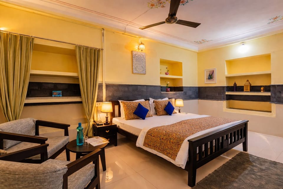 Deluxe Double Room, Courtyard View | Iron/ironing board, free WiFi, bed sheets