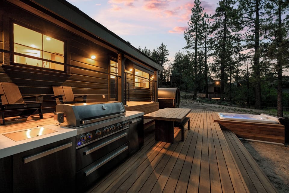 Lakefront Hot Tub Wellness Retreat - Outdoor Wellness Retreat Lakefront - Expansive deck with hot tub, sauna, lakefront views, fire pit, and comfy seating areas.