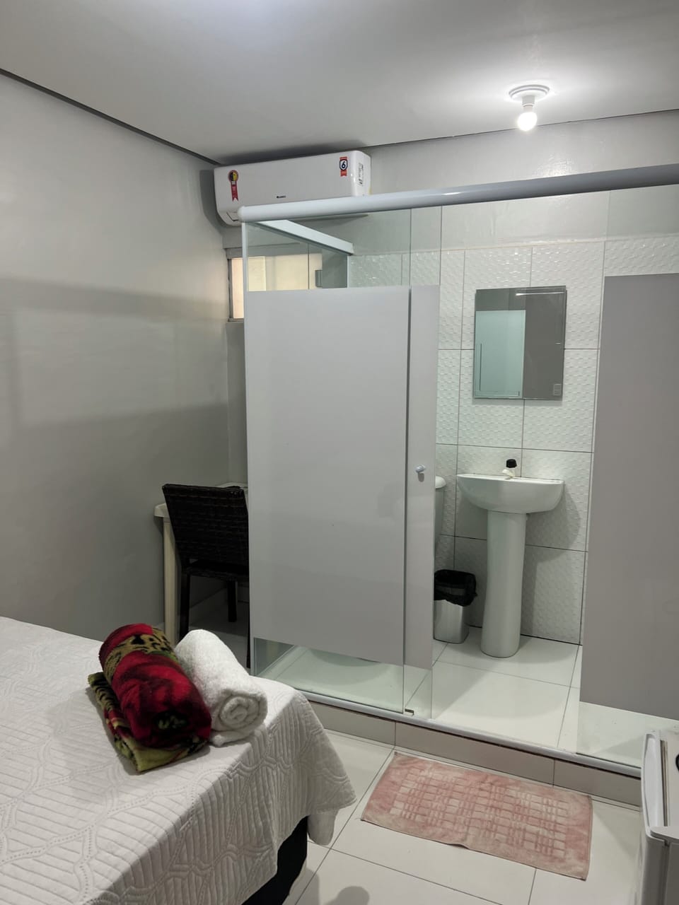 Shower, towels, soap, toilet paper