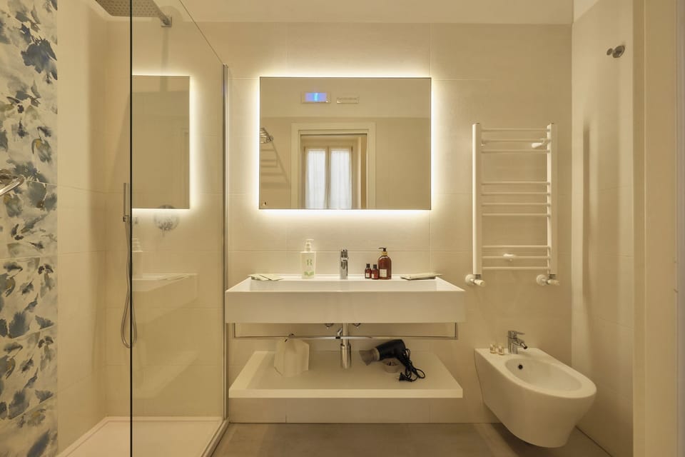 Superior Double or Twin Room | Bathroom | Shower, hair dryer, slippers, soap