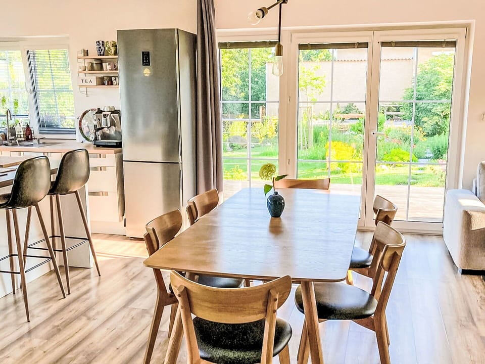 Furniture, Interior Design, Flooring, Wood Flooring, Chair, Floor, Wood, Kitchen & Dining Room Table, Dining Room, Table