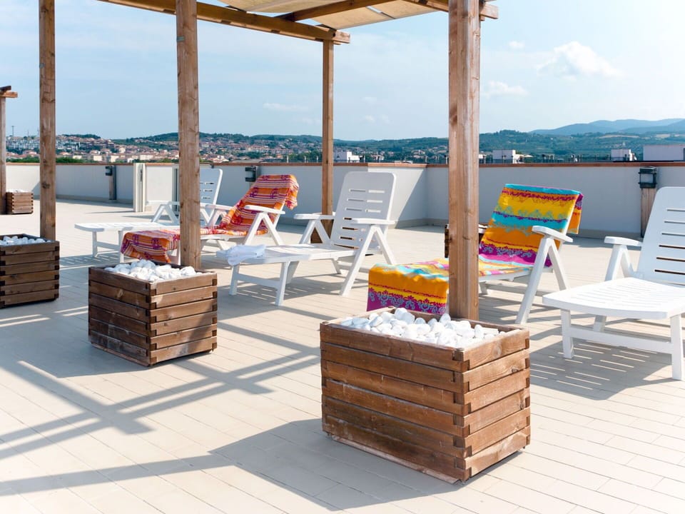 Furniture, Wood, Chair, Floor, Sea, Balcony, Fence, Deck, Hardwood, Wood Stain