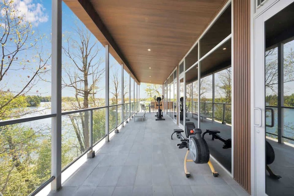Second level covered deck; workout equipment & hammock
